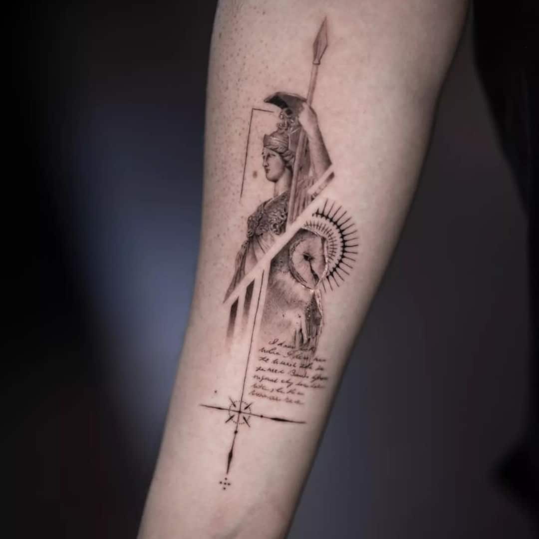 Tattoo of a woman with a spear and lion imagery on arm