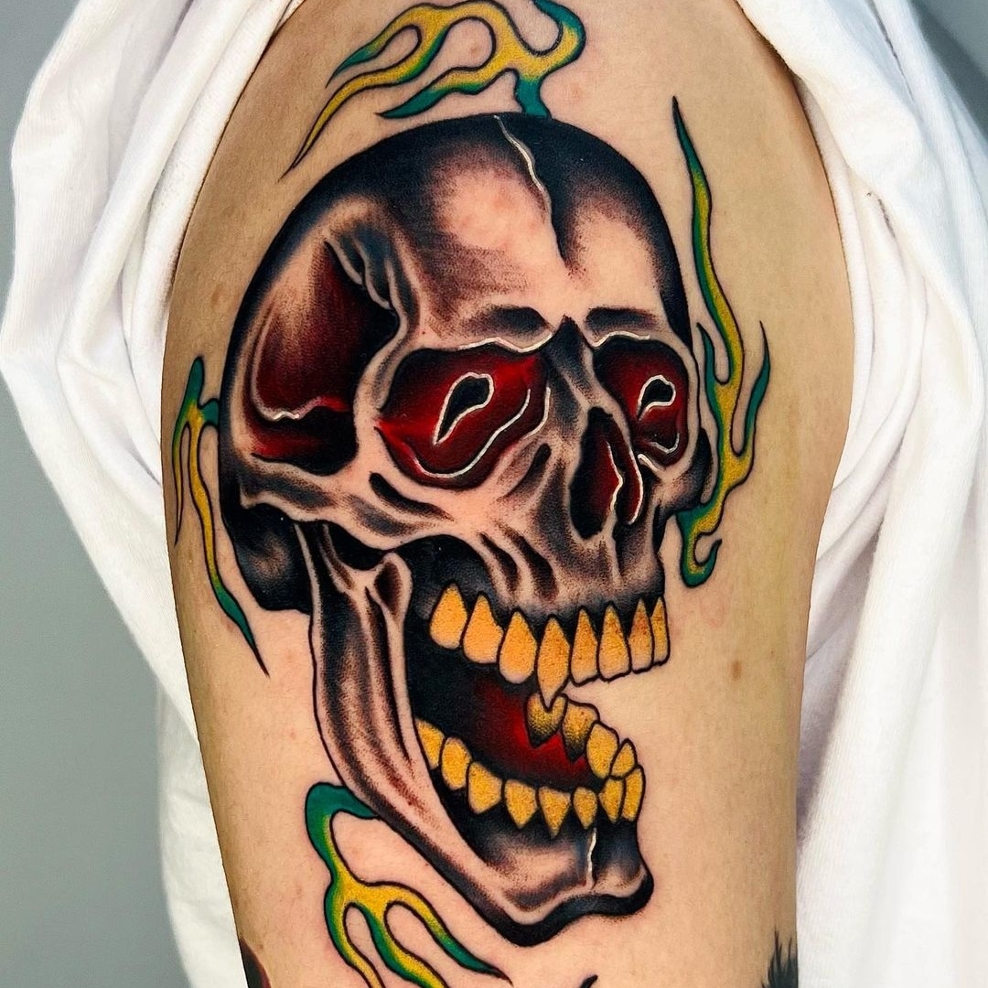 Colorful skull tattoo design on arm
