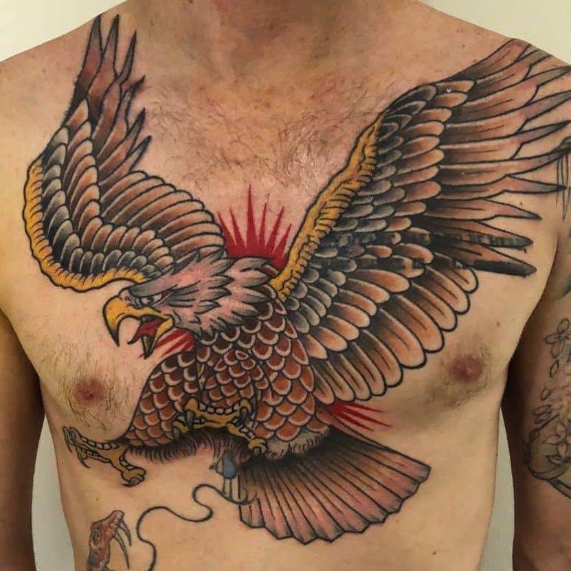 Tattoo of an eagle on a man's chest