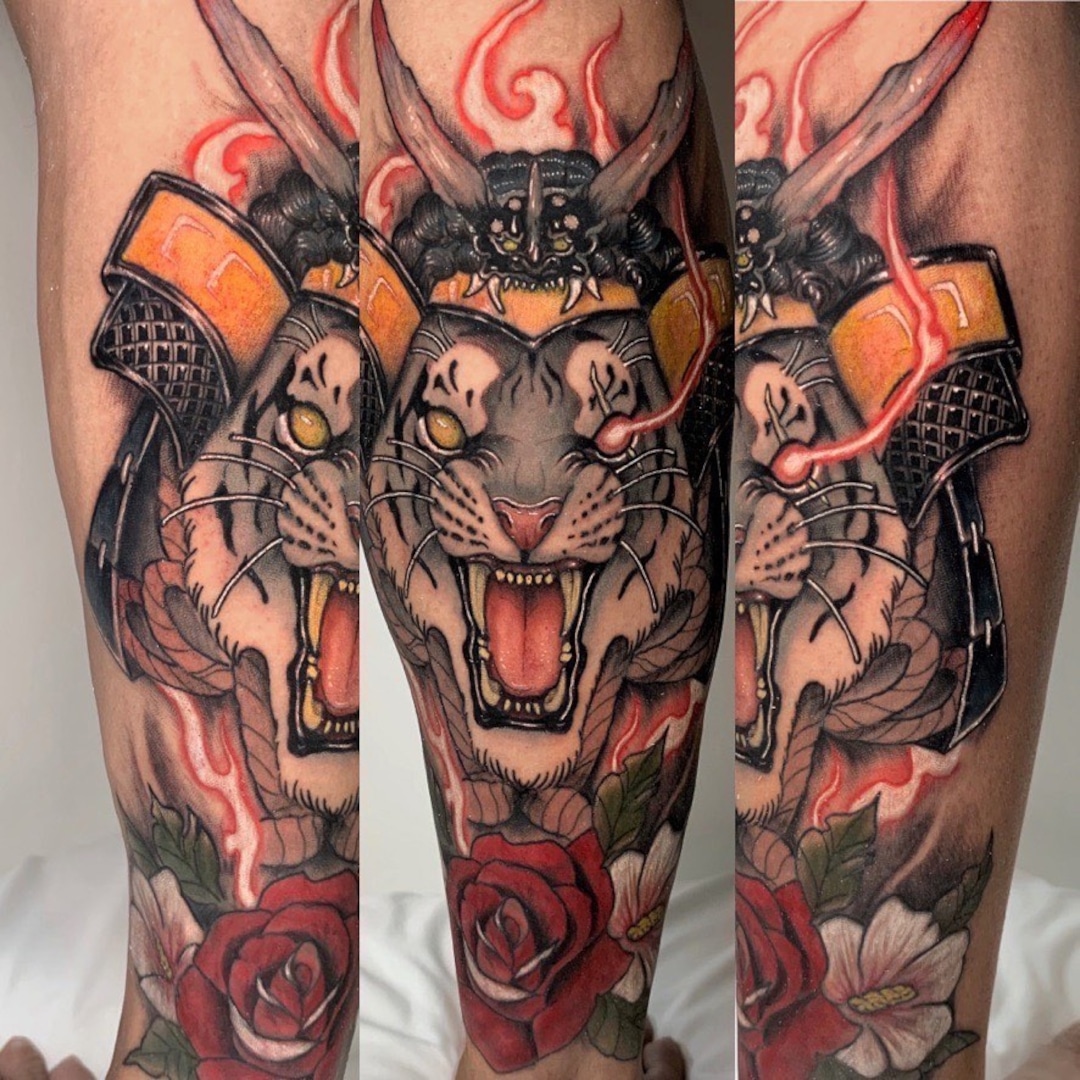 Tattoo design featuring a fierce tiger and roses