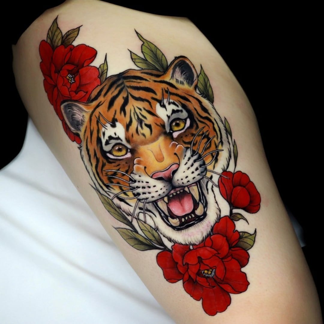 Colorful tiger tattoo with red flowers